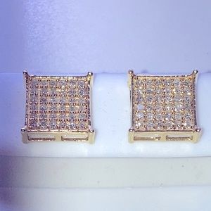 Beautiful 14k solid gold and diamond stud earrings. Designed unknown. Close out.
